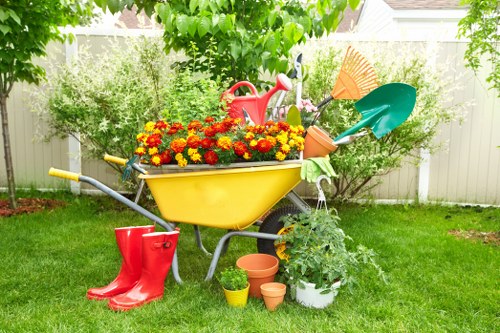 Inspector reviewing garden condition with clipboard